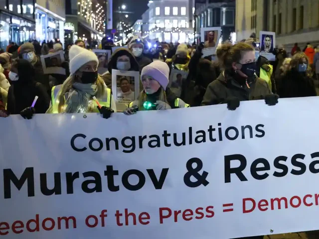 A parade honouring Nobel prize-winning journalists Maria Ressa and Dmitry Muratov in Oslo, Norway, 10 December 2021. Photograph: Sergei Bobylev/Tass