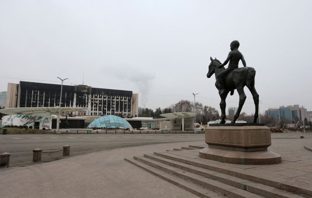 A view shows a fragment of Independence Monument and the city administration headquarters, which was set on fire during recent protests triggered by fuel price increase, in Almaty, Kazakhstan January 11, 2022. REUTERS/Pavel Mikheyev