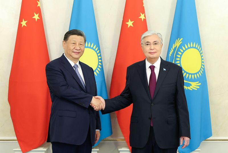 Chinese President Xi Jinping shakes hands with Kazakh President Kassym-Jomart Tokayev in Astana, Kazakhstan, July 3, 2024. Xi held talks with Tokayev at the presidential palace in Astana on Wednesday. [Photo/Xinhua]